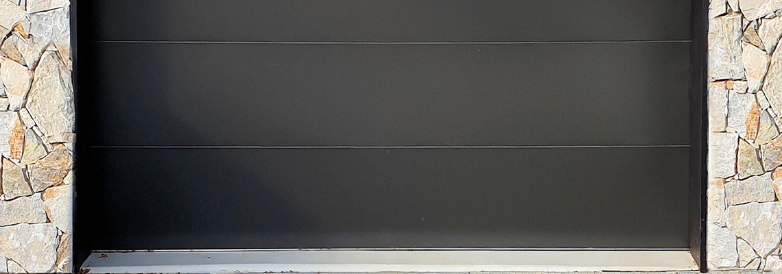 Overhead Black Garage Door Installation in Margate, Florida