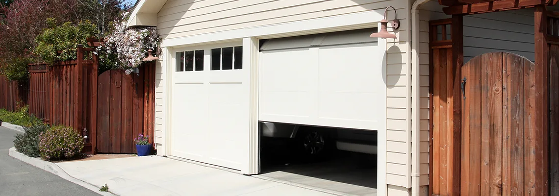 Fix Metal Garage Door Jerking in Margate, Florida
